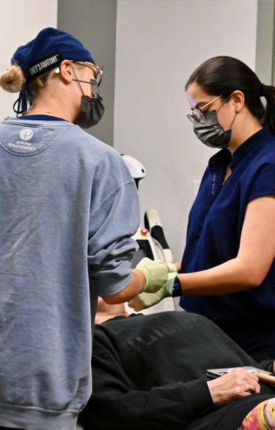 Healthcare workers wearing masks and gloves