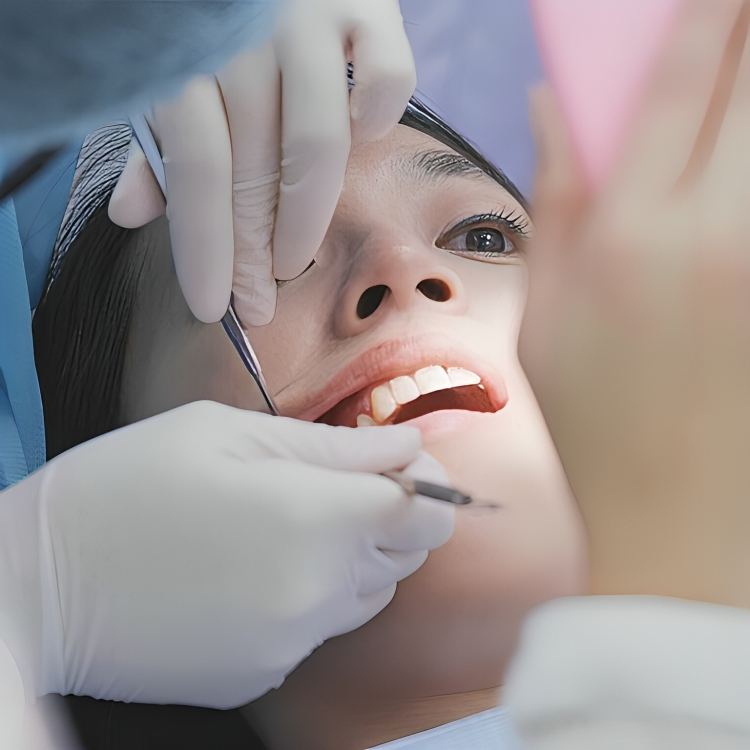 Patient receiving dental care procedure