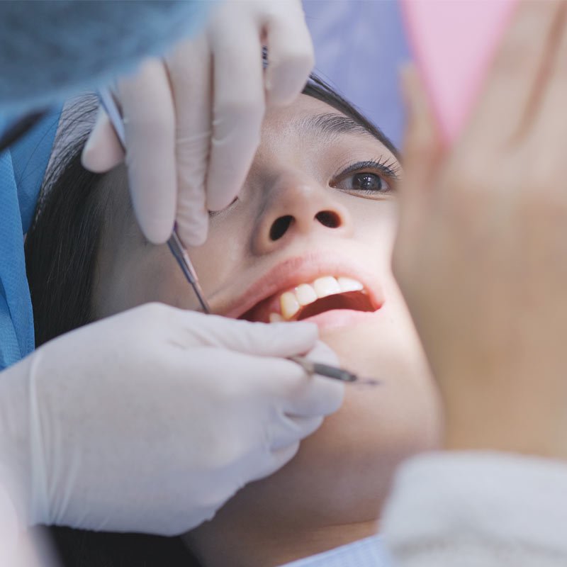Close-up of dentist at work